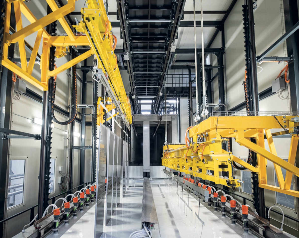 Automated cataphoric coating line at an industrial finishing facility